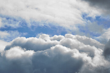 cloud and sky peering through it close-up, cumulus cloud close-up