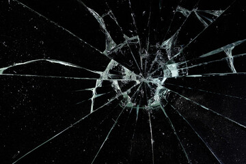 Cracked Pieces Broken Glass Hole on Black Background