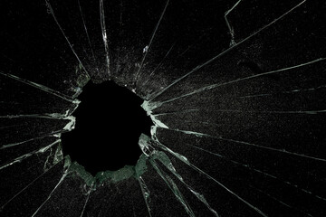Cracked Pieces Broken Glass Hole on Black Background