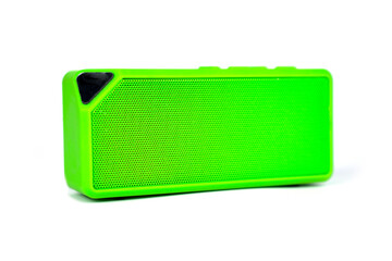 Wireless bluetooth speaker green isolated on white. 
Music amplifier close up