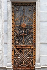 Rusted Iron Filigree Door in a Marble Mausoleum at Recoleta Cemetery, Buenos Asires, Argentina 