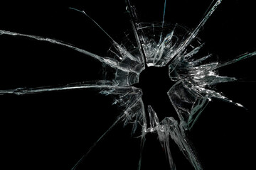 Cracked Pieces Broken Glass Hole on Black Background