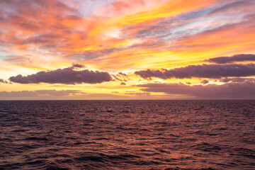 Early Morning Fiery Sunrise of Orange and Purple on the Drake Passage Atlantic Ocean Between...