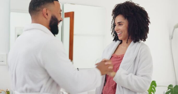Happy couple, bathroom and dancing for fun morning, routine or support in love together at home. Young man and woman with smile enjoying day or grooming for hygiene, energy or getting ready at house