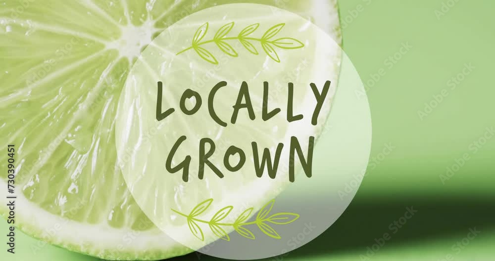 Poster animation of locally grown text over halved lime on green background