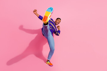Full length photo of cool cheerful guy dressed striped pullover having disco fun empty space...