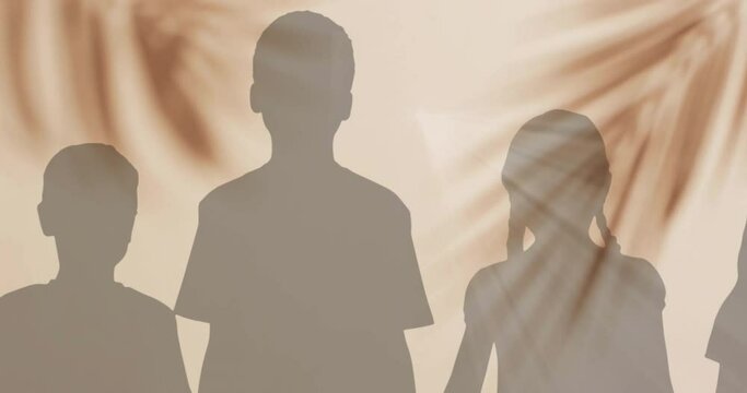 Animation of silhouettes of children and palm tree shadow on beige background