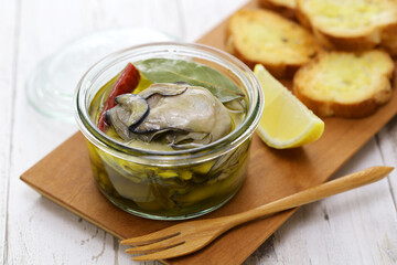 homemade marinated oysters in olive oil