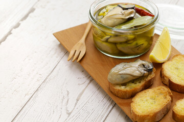 homemade marinated oysters in olive oil