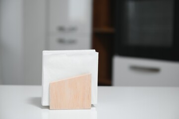 Wooden napkin holder in kitchen