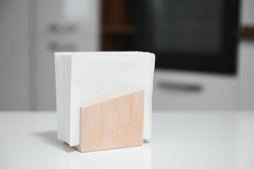 Wooden napkin holder in kitchen