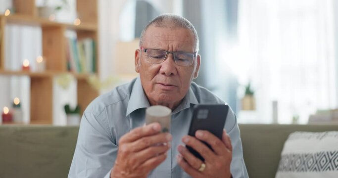 Phone, medicine and senior man with home research, reading label and learning of telehealth services. Online patient with pills bottle, tablet and mobile for information or health benefits on a sofa