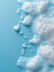 splash of foam from soap or shampoo on blue background