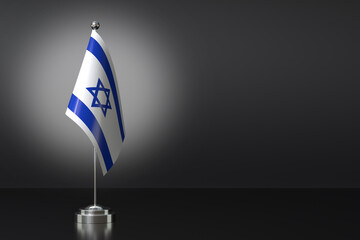 Fototapeta premium Small State of Israel Flag in Front of Black Background, 3d Rendering