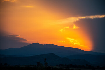 orange sunset in the mountains