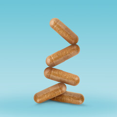 Vitamin. Capsules falling on light blue gradient background