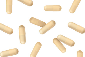 Vitamin. Many capsules falling on white background
