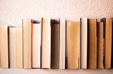 Several old books, one on top of the others. Nice old books.