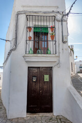 Obraz premium Architectural detail. Facade of a traditional house in the town of Vejer de la Frontera, Spain