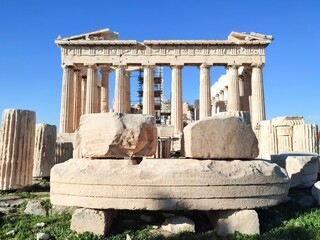 Exterior view of the majestic Parthenon temple at the top of the Acropolis hill in Athens, Greece.