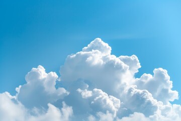 Naklejka na ściany i meble Fluffy white cloud, detailed texture, on a bright azure sky background