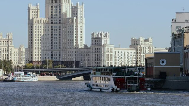  Motor vessel moves by Moskva river near Ukrain hotel