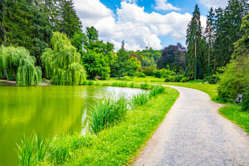 Fototapeta na wymiar Beautiful lush green natural castle park on sunny summer day