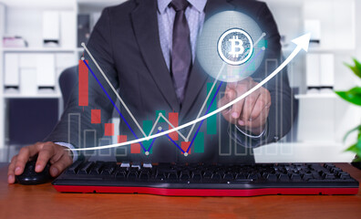 concept, businessman interacting with bitcoin hologram with infographics, on the rise