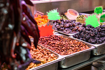 Dried fruits in the market, tempting textures and natural colors, perfect for visual culinary projects.