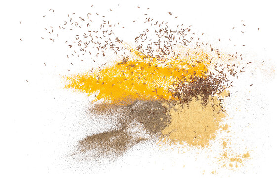 Mixed spice turmeric, ginger powder, cumin and ground black pepper isolated on white