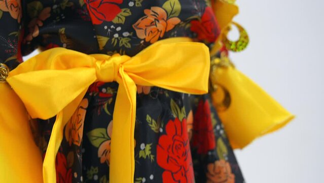 Red-yellow dress. Gypsy romale style, on White Background. High quality 4k footage