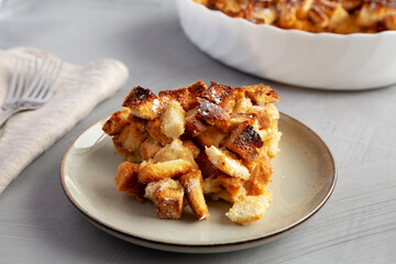 Homemade Bread Pudding on a Plate, side view. Close-up.