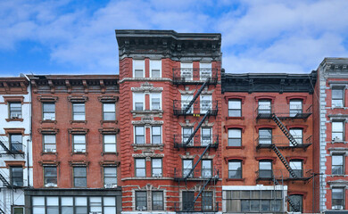 New York City old fashioned apartment buildings with external fire ladders - 730449815