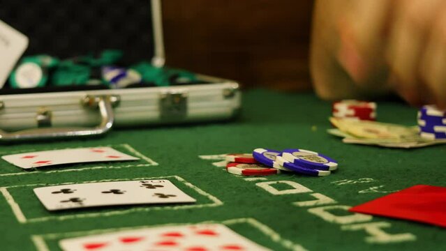  Players drop cards after draw in poker game. Slow motion