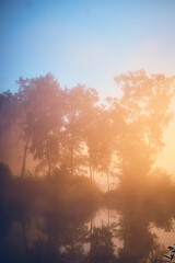Sun rising over foggy lake. High quality photo - 730451208