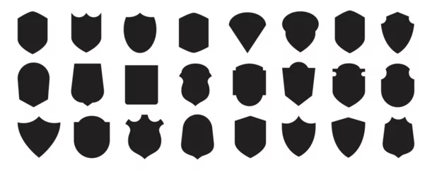 Fotobehang Set of silhouette icons of shields. Military shield insignia of different shapes. Vector elements.  © Rizal