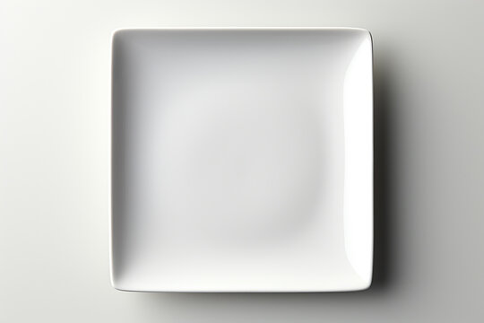 Top view of empty square plate isolated on white