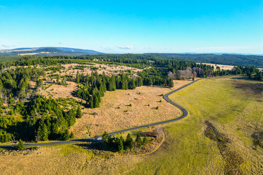 Grass autumn landscape at Ryzovna, Ore Mountains, Czech: Krusne hory, Czechia. Aerial view from drone.