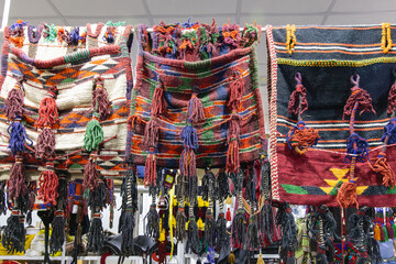 Hand bags for sale at the market in Tabuk.