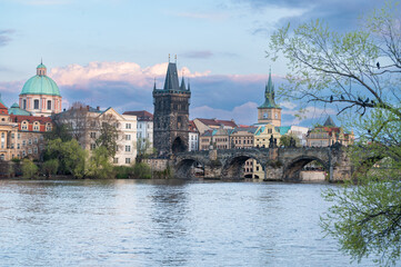 Prague, Czech Republic skyline with historic Charles Bridge and Vltava river on sunny day.
- 730459050