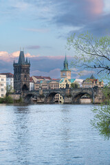 Prague, Czech Republic skyline with historic Charles Bridge and Vltava river on sunny day.
- 730459085