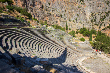 Ancient amphitheater of Delphi. Archaeological site in Greece. Greek religious sanctuaries to the god Apollo. UNESCO World Heritage. View of ancient Delphi theater.