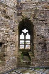 Fototapeta na wymiar Ancient Beauty: A Glimpse of Caernarfon Castle’s Stone Walls