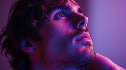 Close-up of a man in a thoughtful pose, in front of a purple studio background generative ai