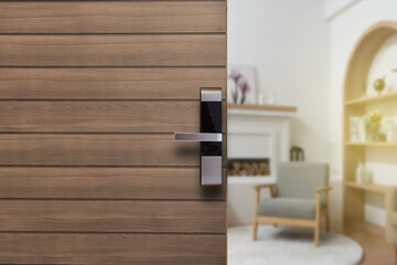Digital Door handle or Electronics knob  for access hotel room security, Door wooden half opening through interior living room background, selective focus