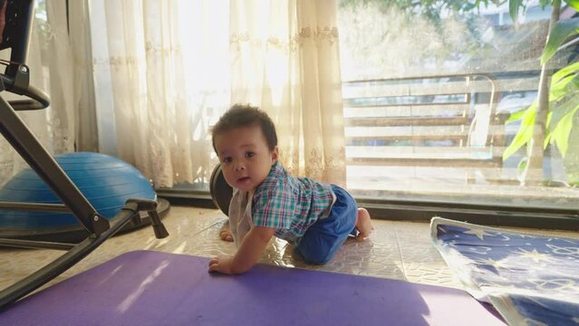 Asian kids are starting to learn how to crawl independently.