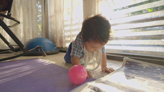 Asian kids are starting to learn how to crawl independently.