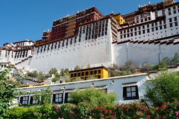Once home to the Dalai Lama, Potala Palace is a popular tourist attraction in Lhasa. - obrazy, fototapety, plakaty