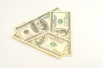 Lots of 100 dollar bills, the concept of US cash money. US paper money. Bribery with a wad of...