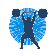 Silhouette of a weight lifting male athlete in action pose. Silhouette of a male athlete in weight lifting sport.